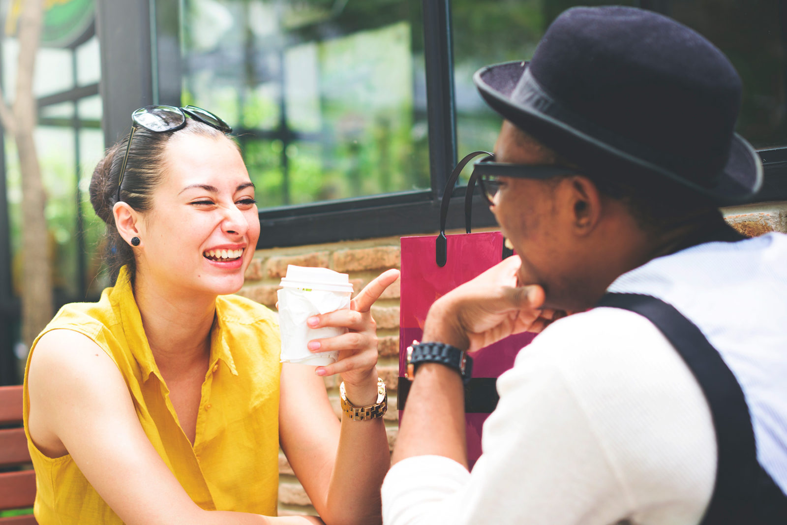 Couple sitting laughing - great communication skills