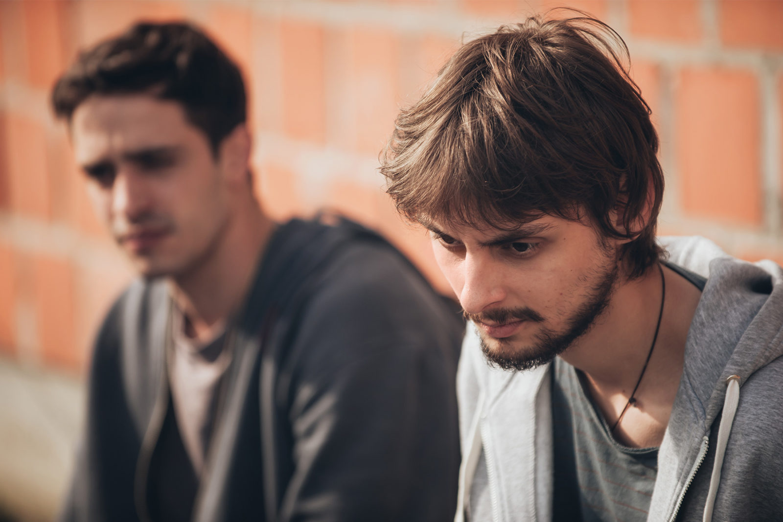 Two men sat together talking - mate suicidal