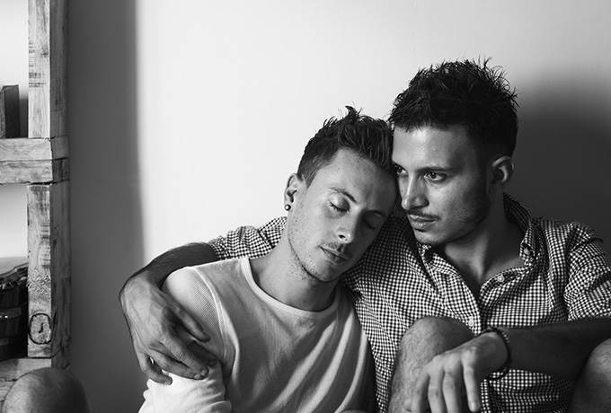 Two men sitting together