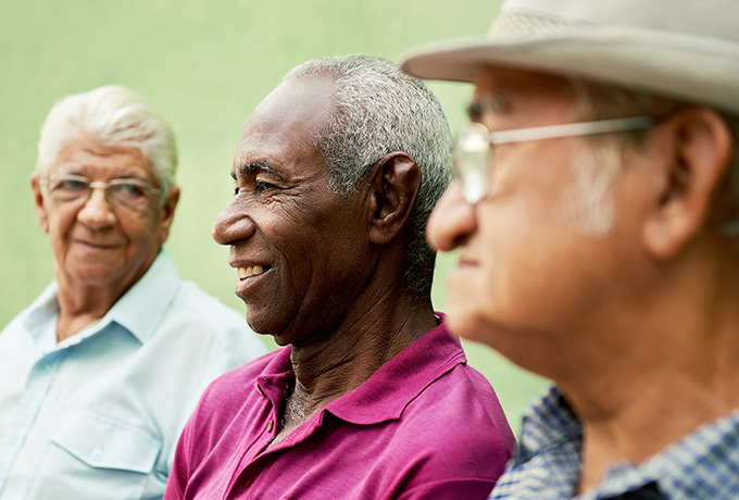 Men sat together discussing separation in later life