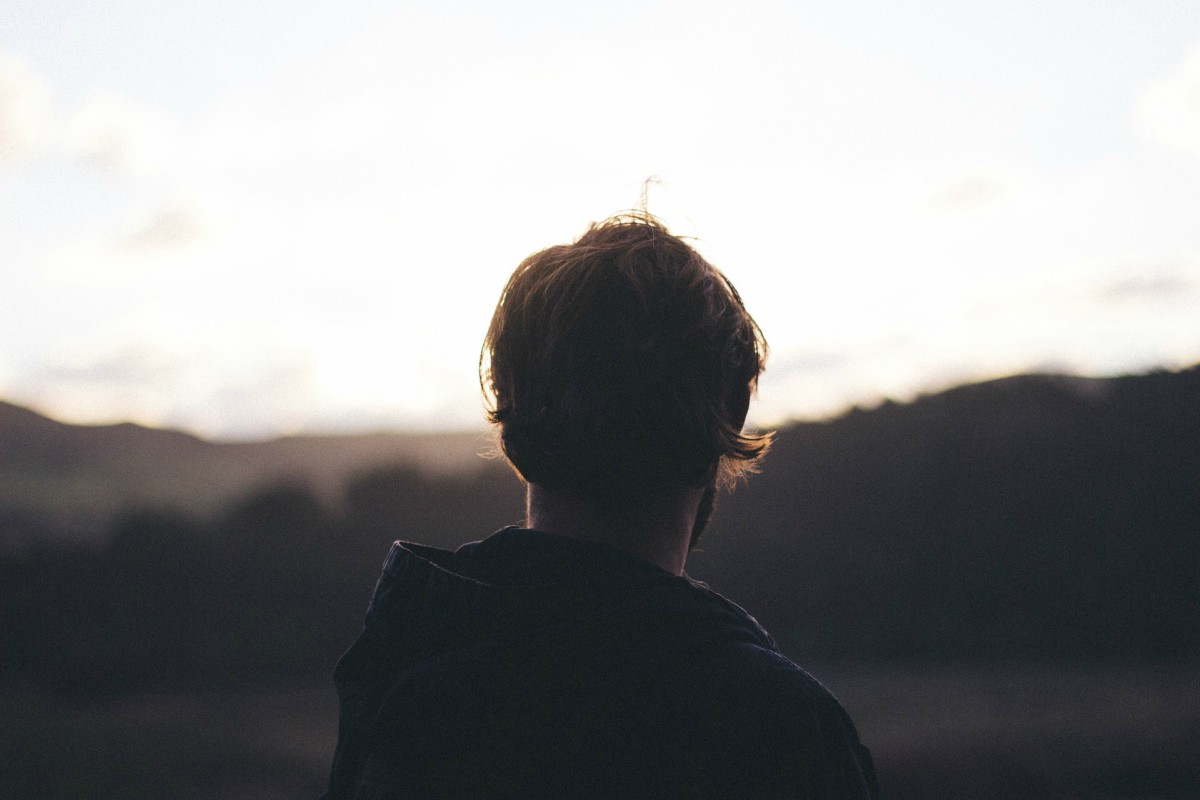 Man looking out over the horizon