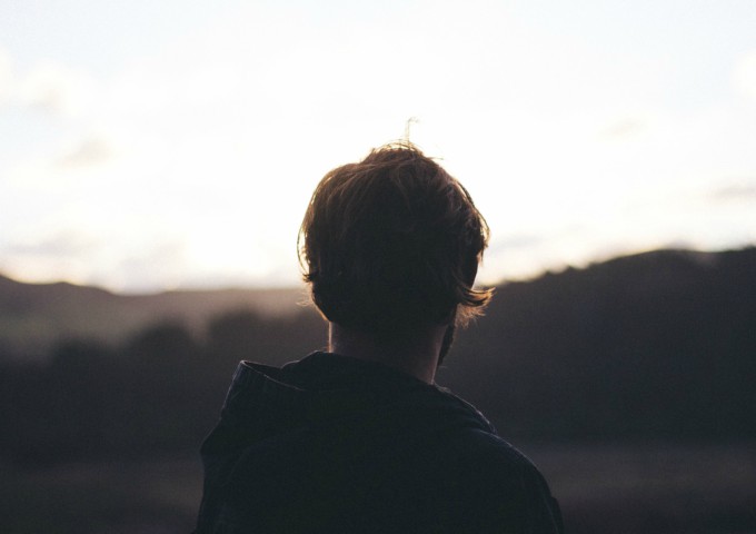 Man looking out over the horizon