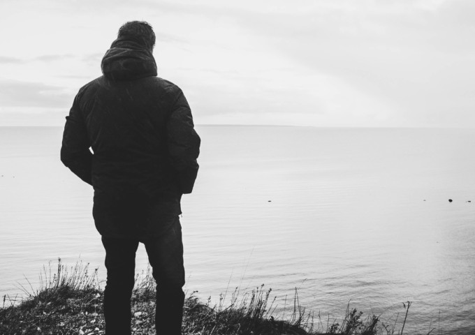 Man standing alone in a field