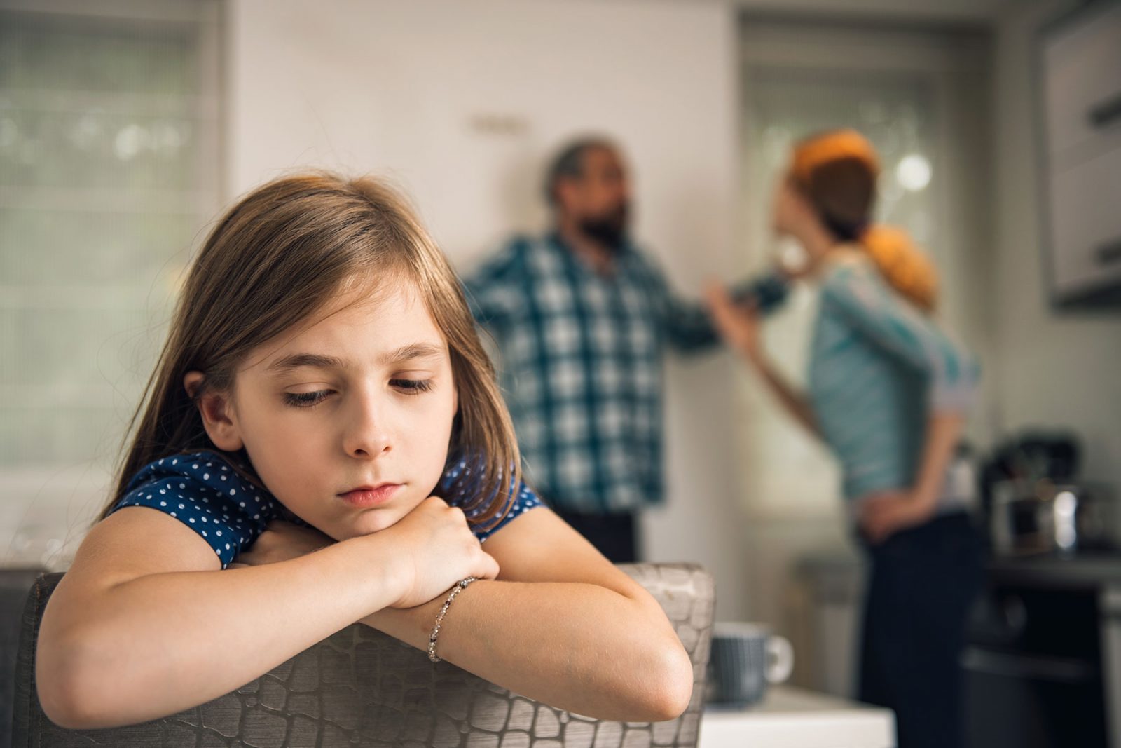 Child listening to parents arguing