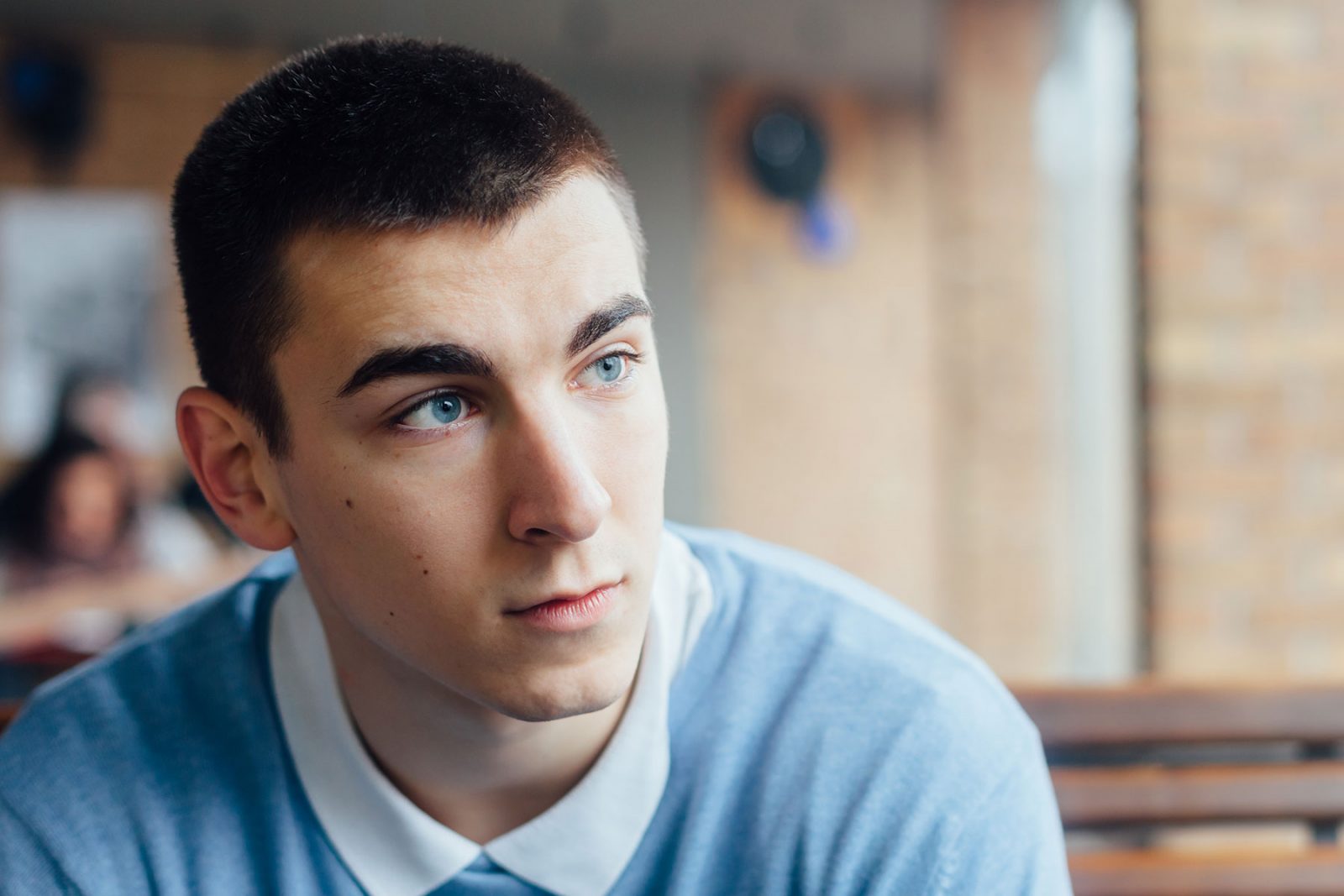 Man waiting for a drink at a bar